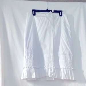 Context skirt, size 10 white with pleated detail on skirt bottom. 100% cotton